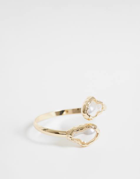 ASOS DESIGN wrap-around cuff bracelet with faux pearl detail in gold tone - view 1