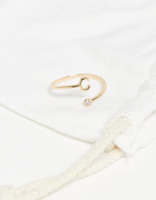 ASOS DESIGN wrap-around ring with cubic zirconia stone and C initial in gold tone with gift bag, 3 of 3