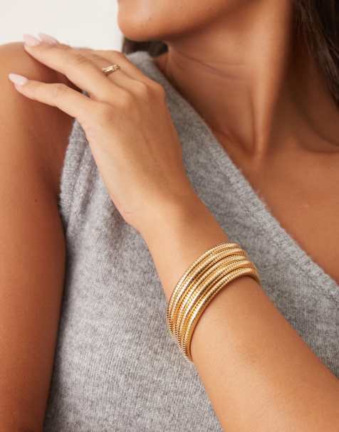 ASOS DESIGN wrap-around stretchy bracelet in gold tone - view 1