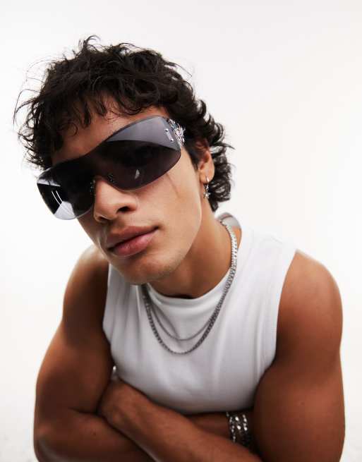 ASOS DESIGN Wrap around y2k rimless sunglasses with graphic arm detail in black, 2 of 4