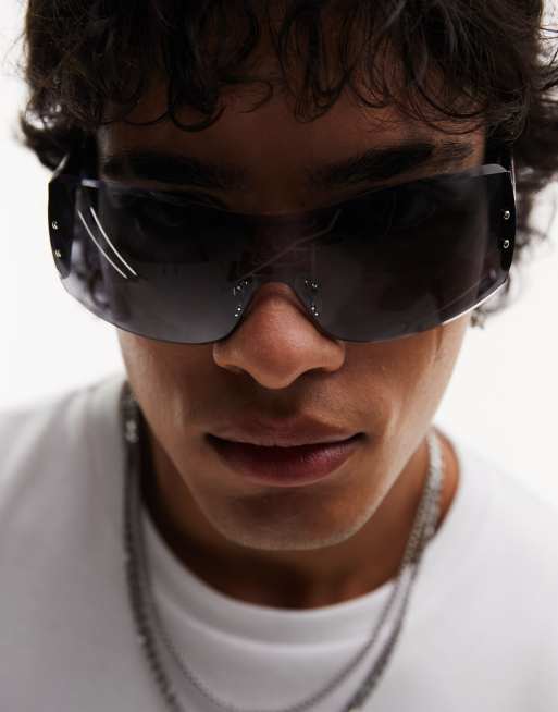 ASOS DESIGN Wrap around y2k rimless sunglasses with graphic arm detail in black, 3 of 4