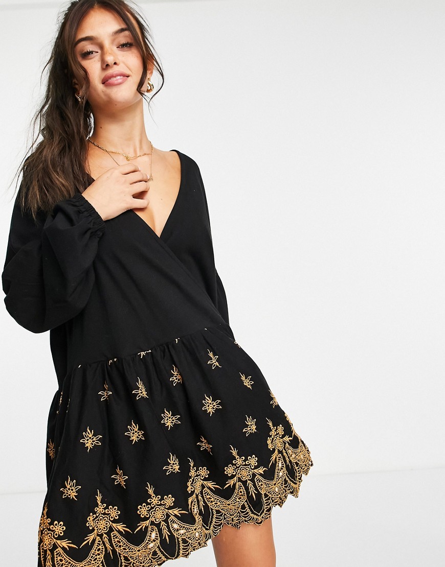ASOS DESIGN wrap dress with gold cutwork embroidery detail in black