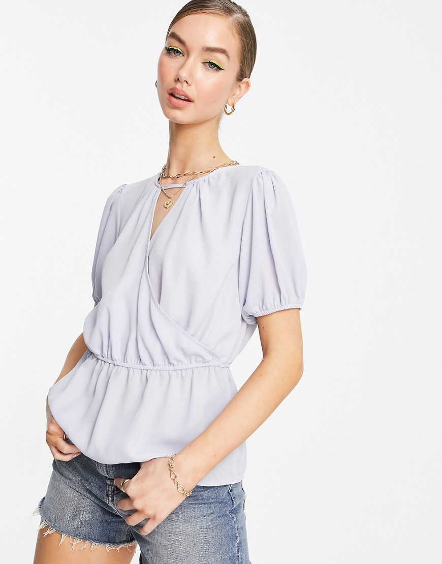 ASOS DESIGN wrap front blouse with peplum hem and puff sleeves in light blue-Blues
