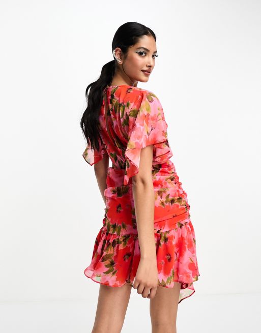 ASOS DESIGN wrap front chiffon mini dress with ruched side and peplum hem in pink floral