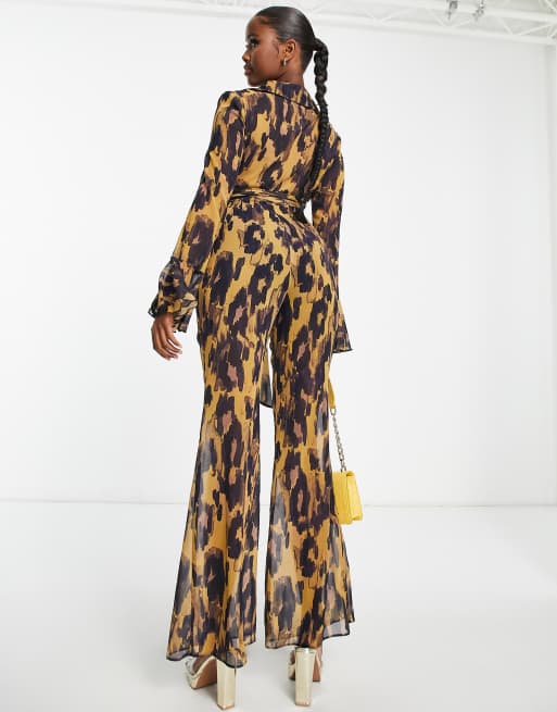 ASOS DESIGN wrap front jumpsuit with fluted sleeve in leopard