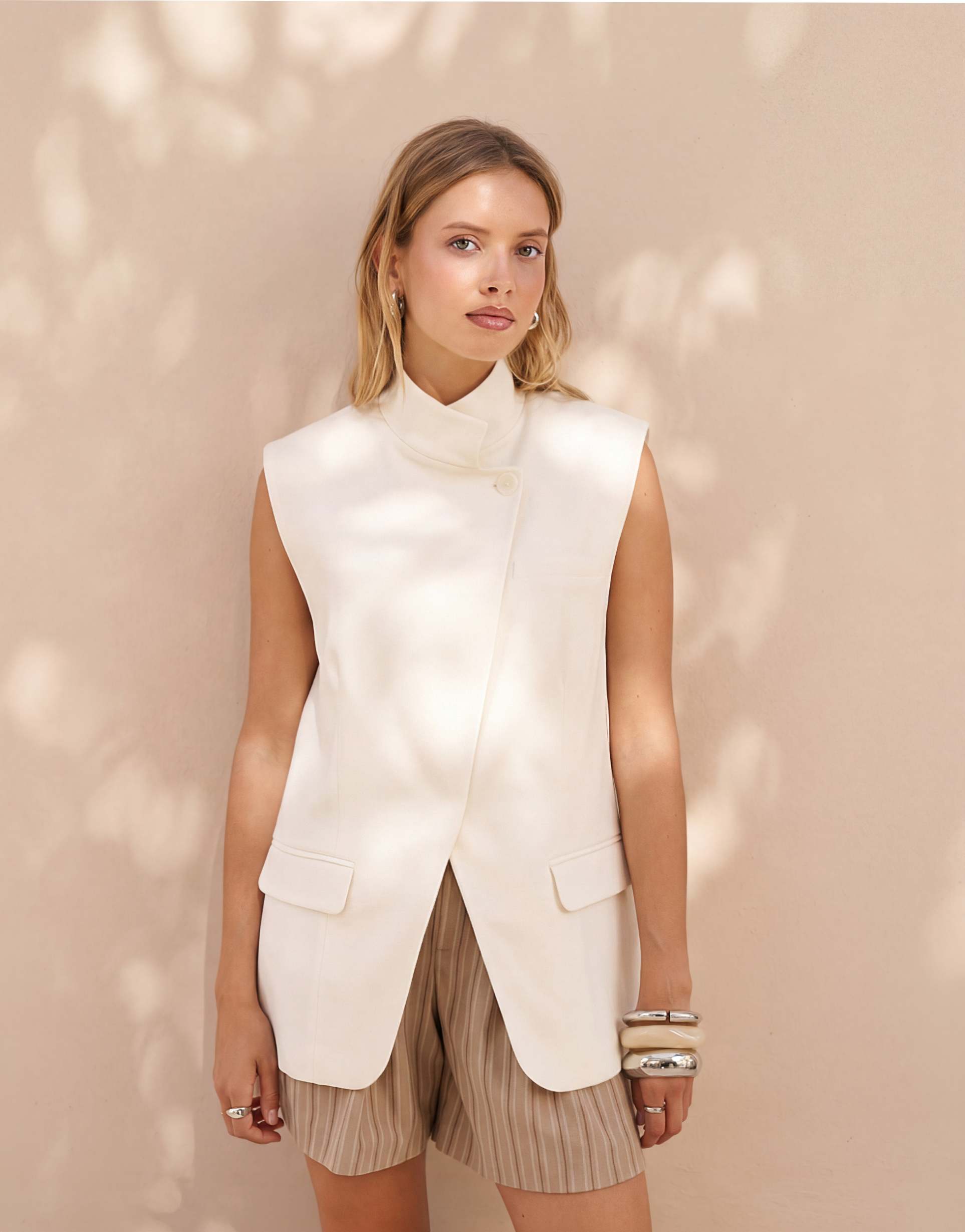 asos design wrap front sleeveless blazer in ivory