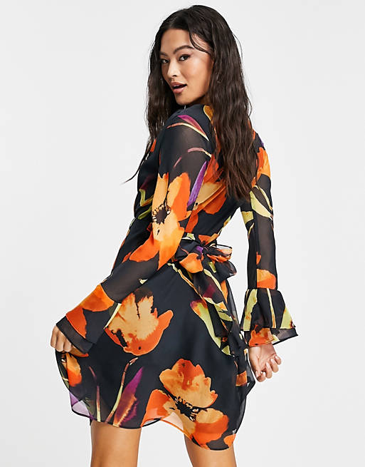 Women wrap front tie skirt mini dress in oversized abstract floral 