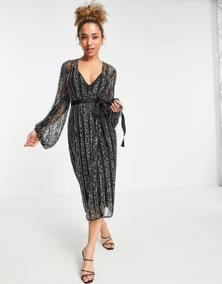asos design sexy pencil midi dress with embellished panels ASOS DESIGN wrap midi pencil dress with stud embellishment in black