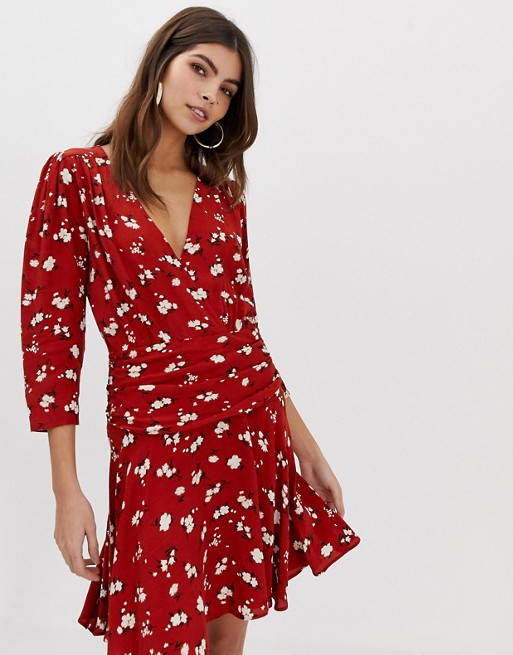 ASOS DESIGN wrap mini dress with ruched skirt in ditsy floral | ASOS