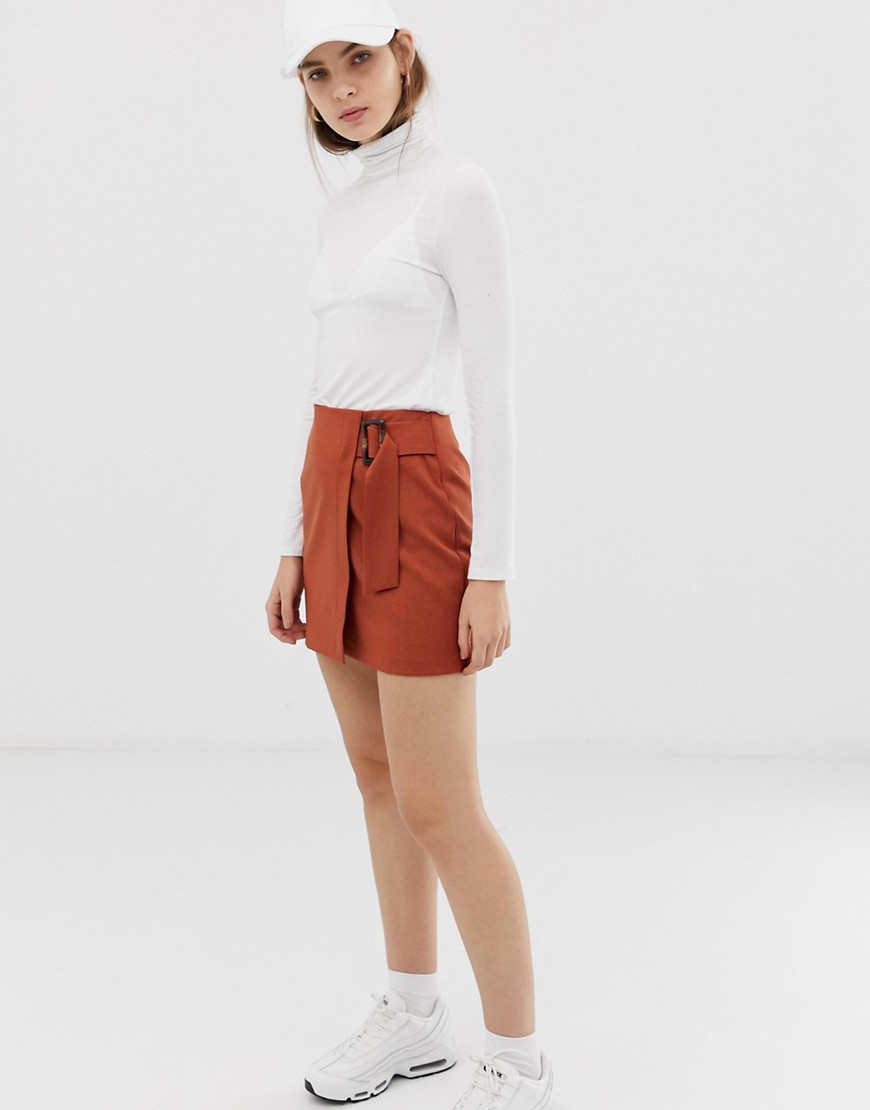 ASOS DESIGN wrap mini skirt with horn buckle-Red
