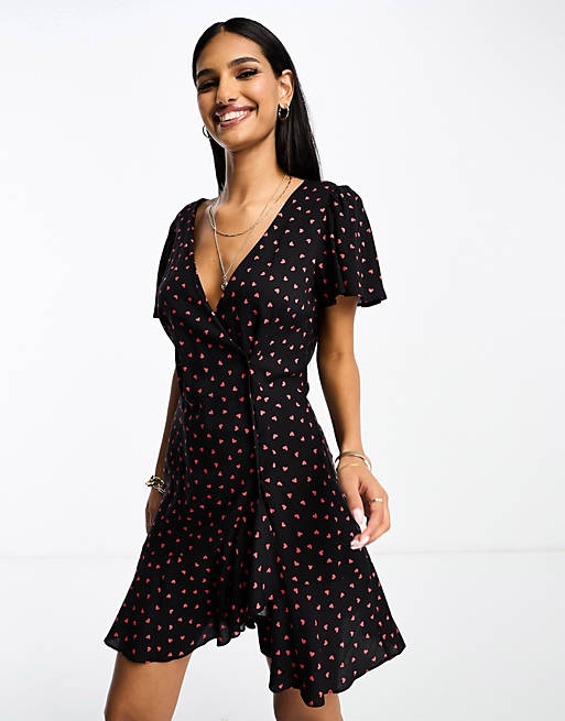 ASOS DESIGN wrap mini tea dress with buttons in black heart print | ASOS