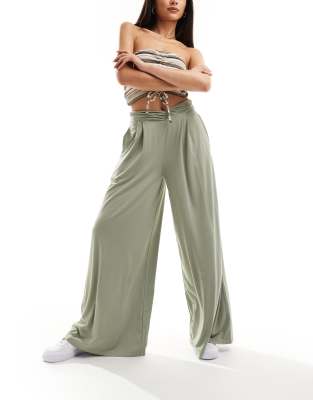 ASOS DESIGN WRAP OVER WAIST PLEATED WIDE LEG PANTS IN SAGE-GREEN