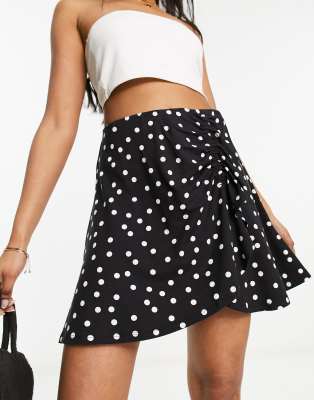 ASOS DESIGN wrap ruffle mini skirt in polka dot-Multi