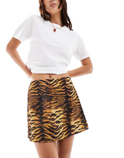 ASOS DESIGN wrap satin mini skirt in animal print ASOS