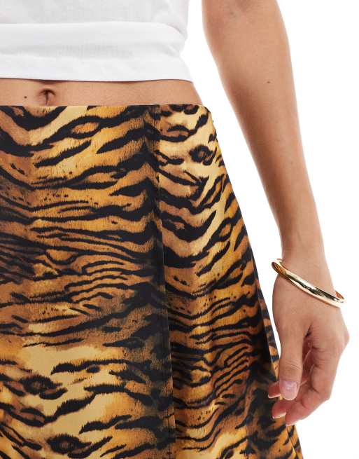 ASOS DESIGN wrap satin mini skirt in animal print