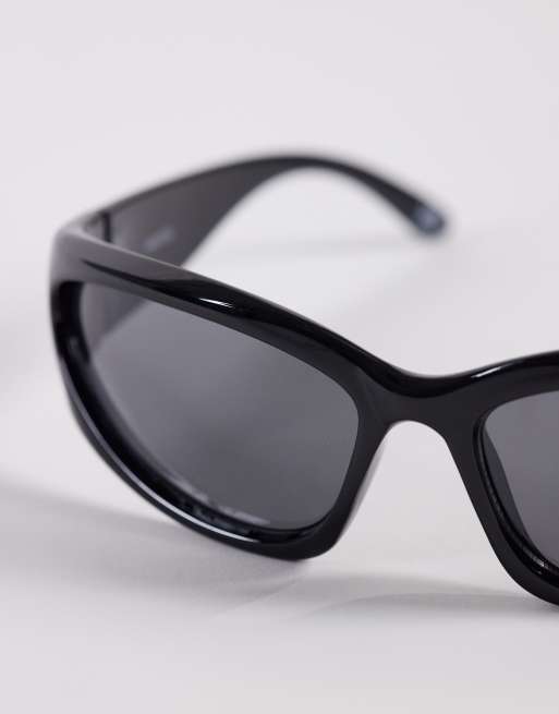 ASOS DESIGN wrap sunglasses in black with smoke lens, 2 of 3
