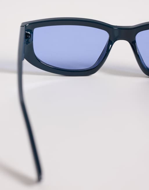 ASOS DESIGN wrap sunglasses in crystal teal frame with blue lens, 2 of 3