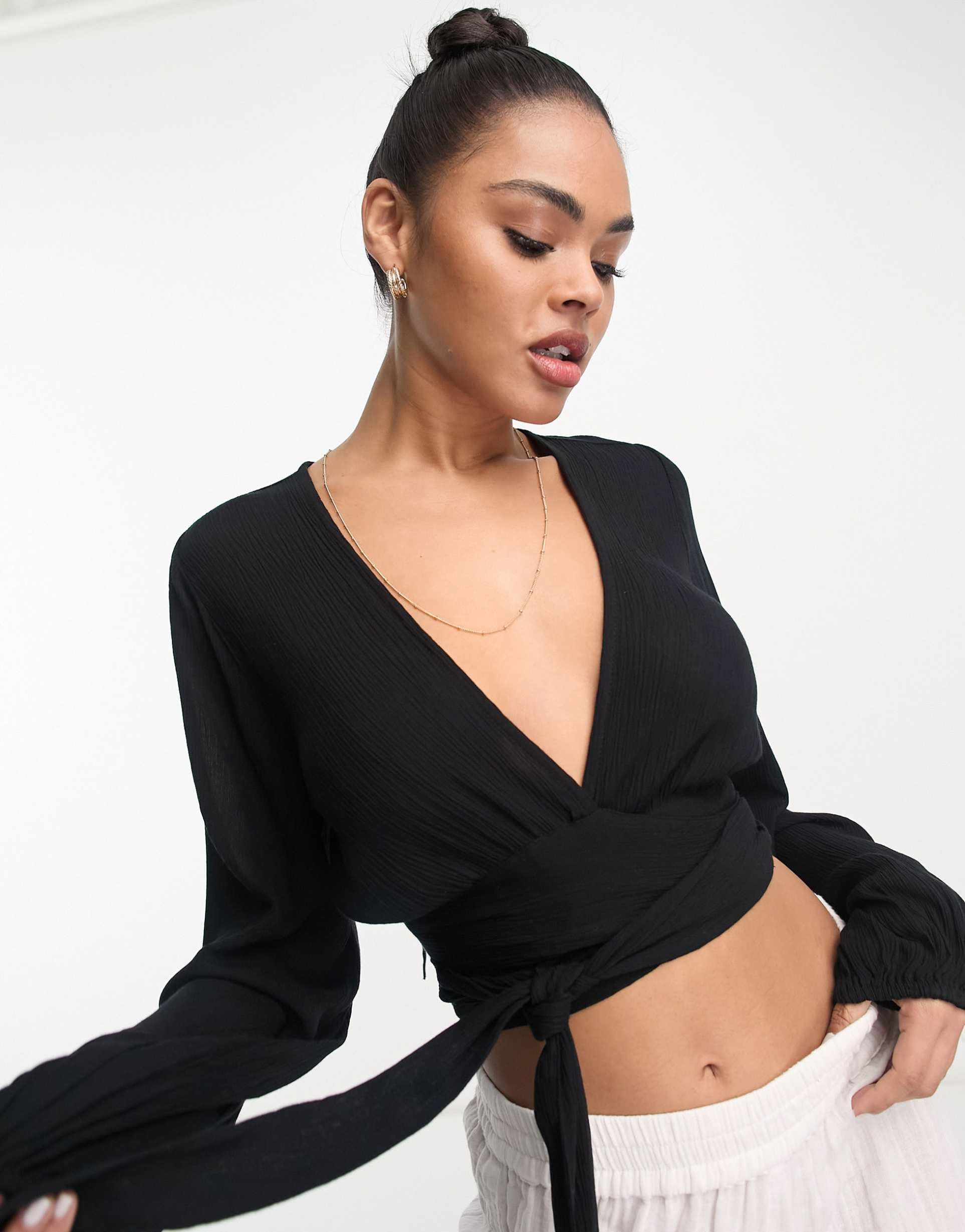 asos design wrap tie long sleeve beach crop top in black