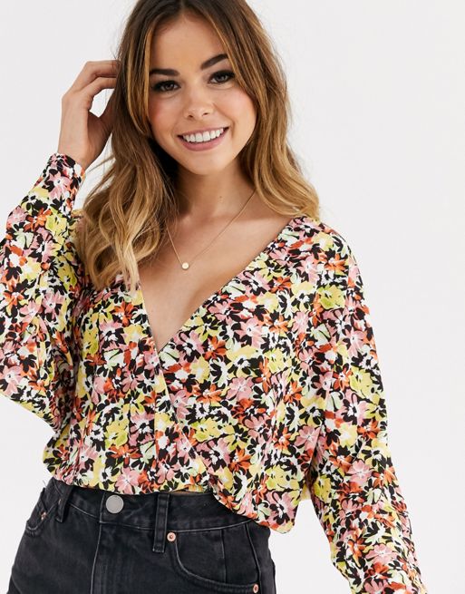 ASOS DESIGN wrap top in slinky fabric with batwing sleeve in ditsy | ASOS