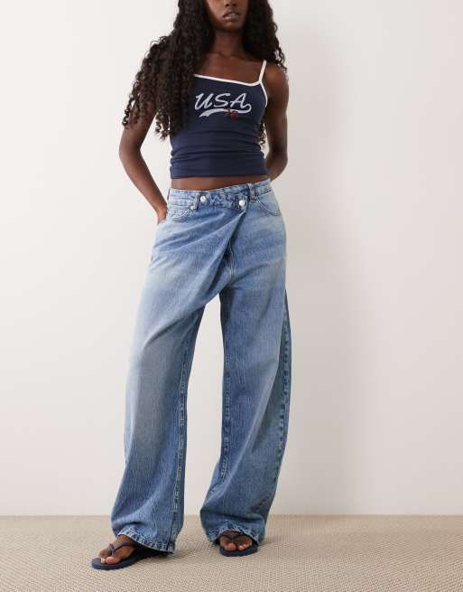 ASOS DESIGN wrap waist barrel jeans in mid blue