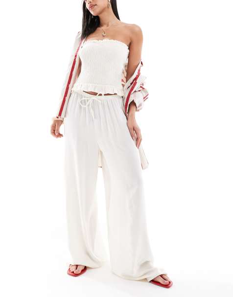 ASOS DESIGN – Wsuwane spodnie z kieszenią z imitacji lnu w kolorze ecru - view 1