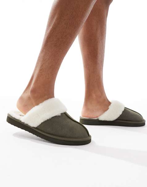 ASOS DESIGN – Wyściełane sztucznym kożuszkiem kapcie klapki z zamszu w kolorze khaki - view 1
