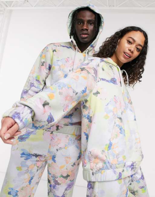 ASOS DESIGN x glaad& - Felpa unisex a fiori con cappuccio in coordinato  