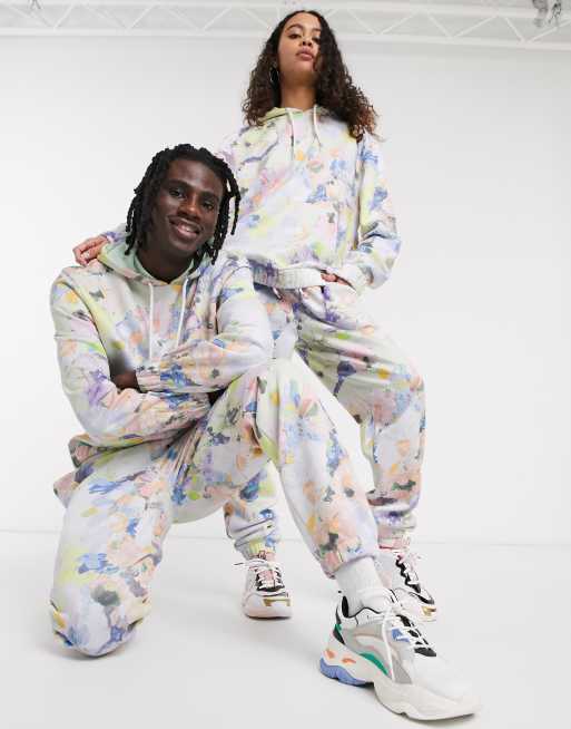 ASOS DESIGN x glaad& unisex co-ord trackies with all over floral print