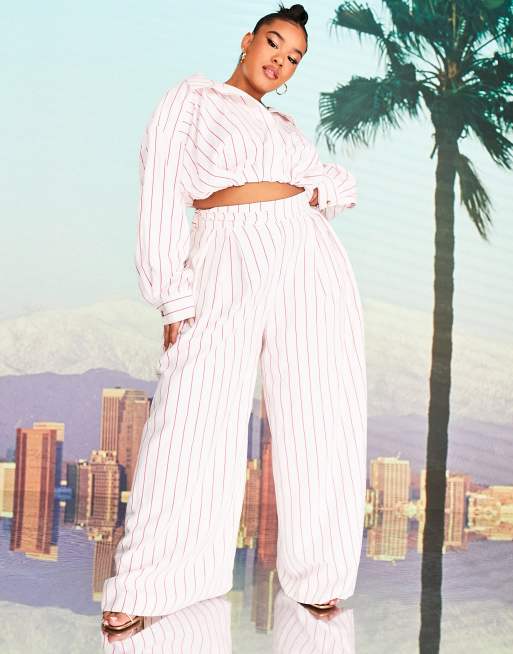 ASOS DESIGN x MILLIE Curve wide leg pants with tie waist in pink stripe