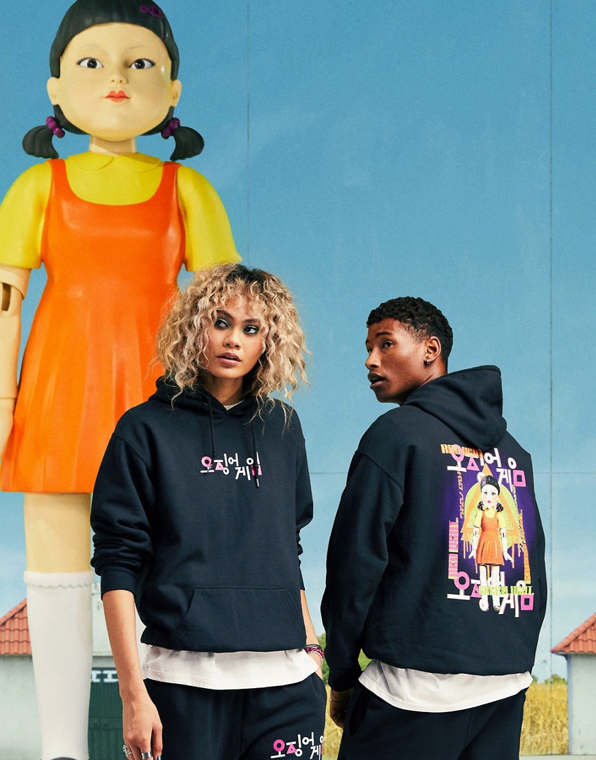 ASOS DESIGN X Squid Game: The Challenge unisex Younghee Doll Hoodie in washed black