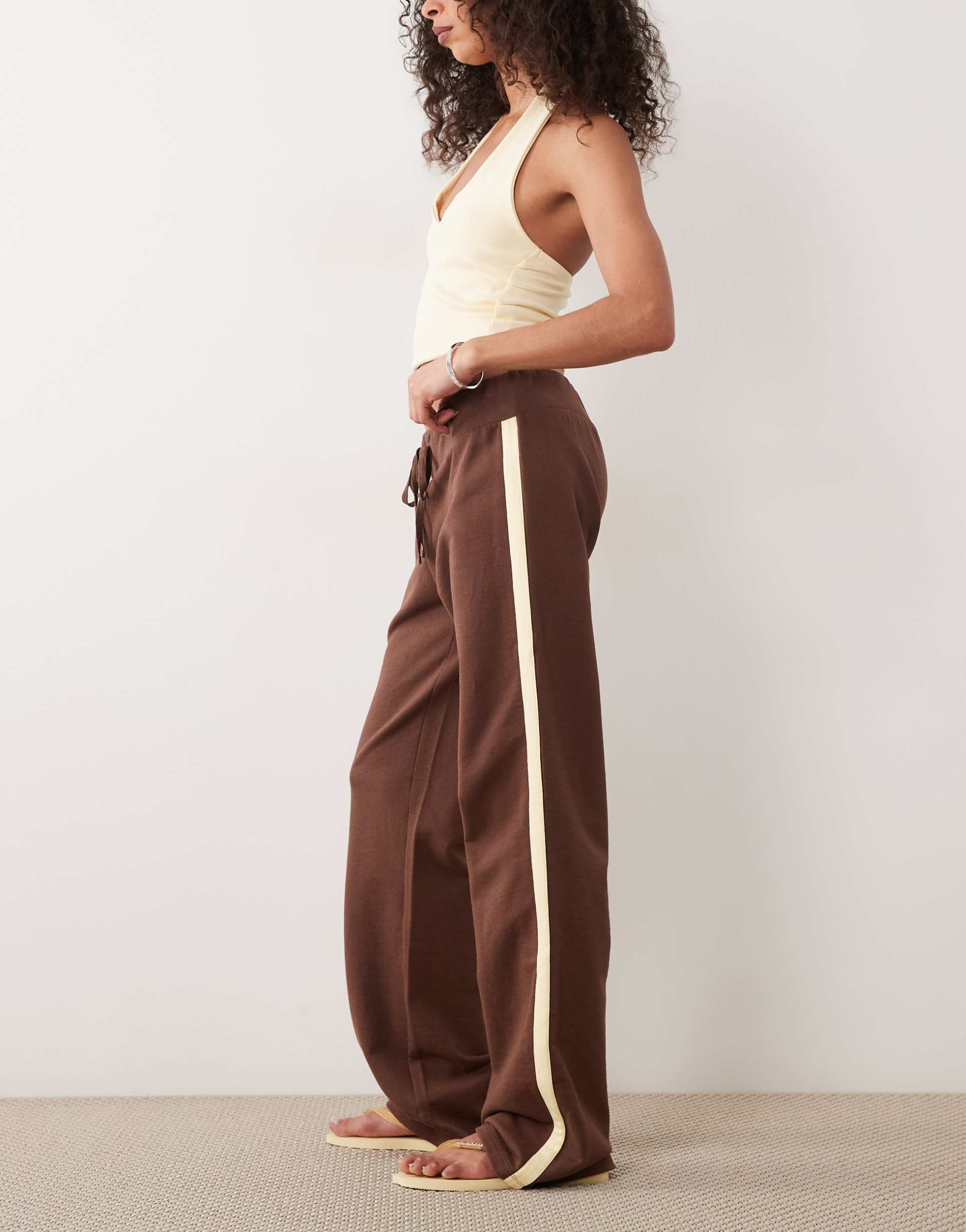 asos design yoga pants with contrast side stripe in chocolate