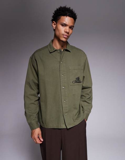 ASOS DESIGN – Zakładana przez głowę koszula oversize w kolorze khaki z haftowanym kwiatowym wzorem na plecach - view 1