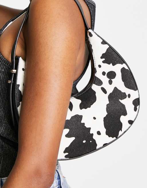 ASOS DESIGN – Zaokrąglona torebka na ramię w krowie łaty, 3 z 4