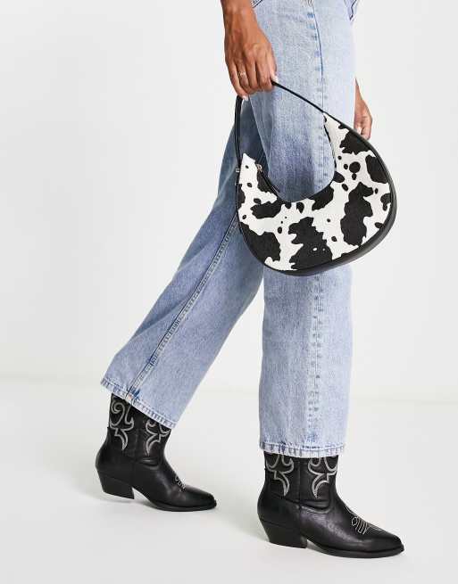 ASOS DESIGN – Zaokrąglona torebka na ramię w krowie łaty, 4 z 4