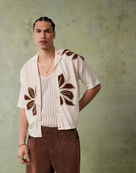 ASOS DESIGN relaxed knitted button through polo with floral embroidery in ecru