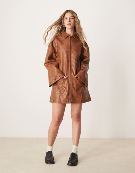 ASOS DESIGN pu mini zip through shirt dress with metal stud and eyelet detail in washed tan