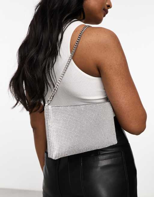 ASOS DESIGN – Zapinana na suwaki srebrna kopertówka z kolczugi z kryształkami i paskiem
