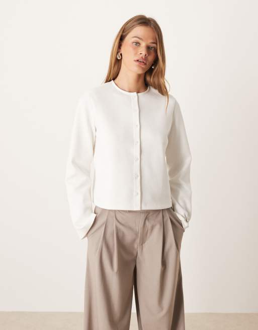 ASOS DESIGN – Zapinany na guziki top o pudełkowym kroju z poduszkami na ramionach z materiału interlock w kolorze kości słoniowej