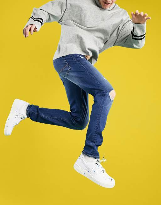 ASOS DESIGN – Zerrissene enge Jeans in dunkelblauer Waschung