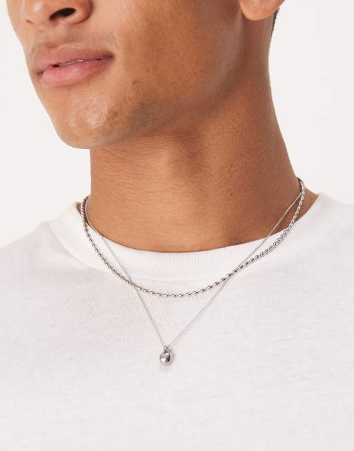 ASOS DESIGN – Zestaw 2 naszyjników ze stali nierdzewnej w odcieniu srebra z zawieszką w kształcie łezki z efektem stopienia  