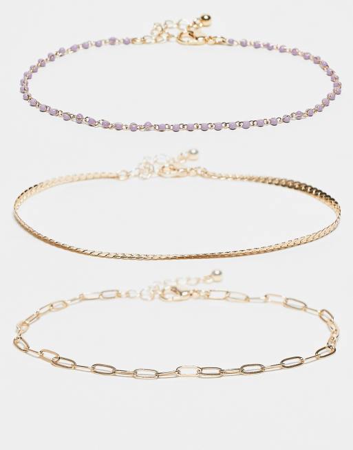 ASOS DESIGN – Zestaw 3 bransoletek na kostkę z fioletowymi koralikami i łańcuszkiem w kolorze złota