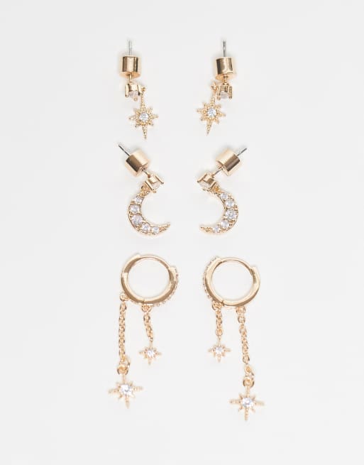 ASOS DESIGN – Zestaw 3 par kolczyków z motywami astrologicznymi w kolorze złota z cyrkoniami w saszetce podarunkowej