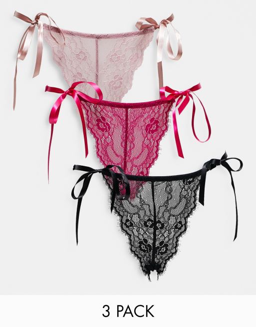 ASOS DESIGN – Zestaw 3 par koronkowych fig brazylijskich z wiązaniem po bokach w kolorach czarnym, różowym i czerwonym