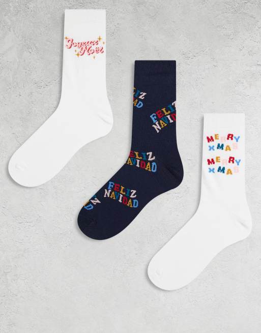ASOS DESIGN – Zestaw 3 par świątecznych skarpetek w różnych kolorach z nadrukiem Feliz Navidad