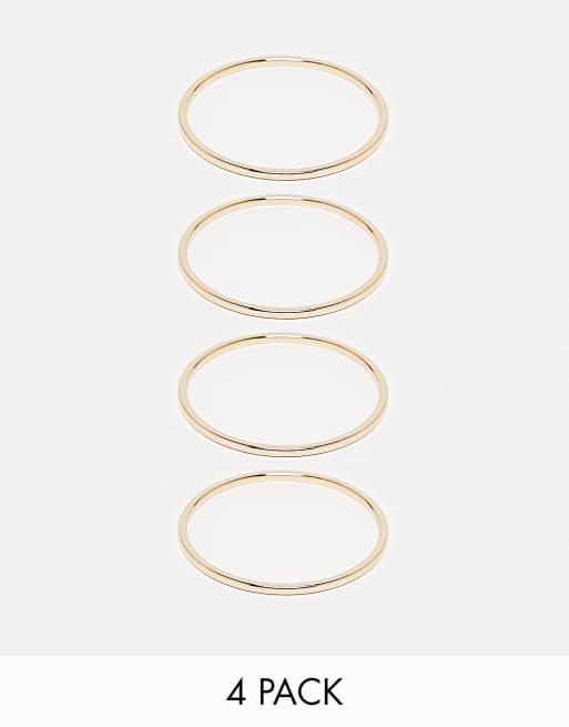 ASOS DESIGN – Zestaw 4 bransoletek bangle w kolorze złotym
