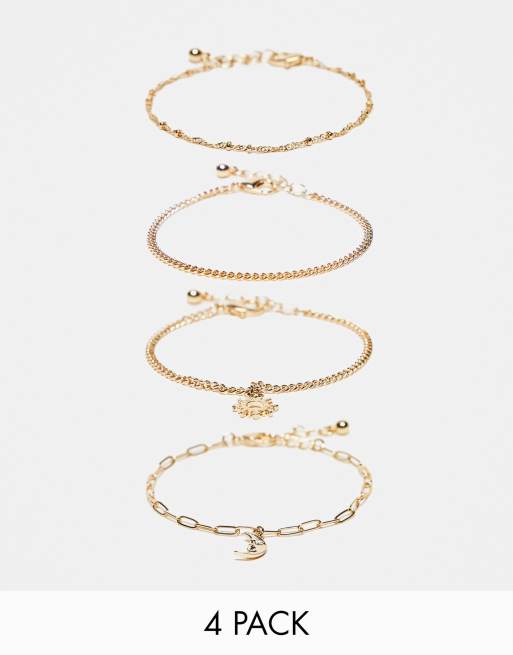 ASOS DESIGN – Zestaw 4 szt. bransoletek w kolorze złota z zawieszkami w kształcie księżyca i słońca