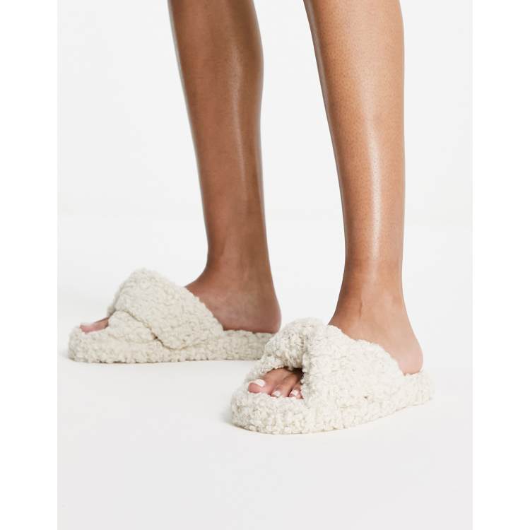 ASOS DESIGN Zeve twist slide slippers in cream sherpa ASOS