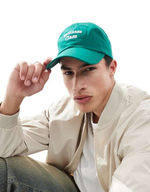 ASOS DESIGN – Zielona czapka z daszkiem i haftowanym napisem „Business Class”