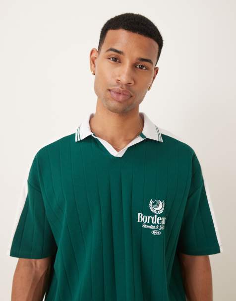 ASOS DESIGN oversized polo with sports chest graphic in green