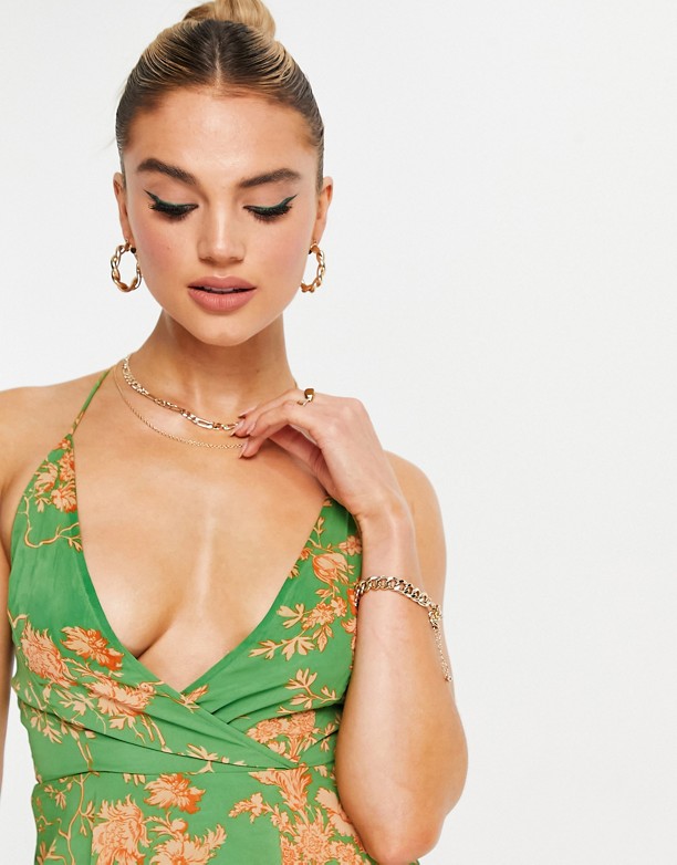  Online ASOS DESIGN – Zielona wzorzysta sukienka mini z wiązaniem na plecach WzÓr w kwiaty